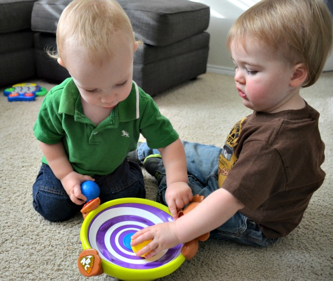 The babies loved playing with Bright Starts Spin and Giggle Puppy as seen on jennsRAQ.com