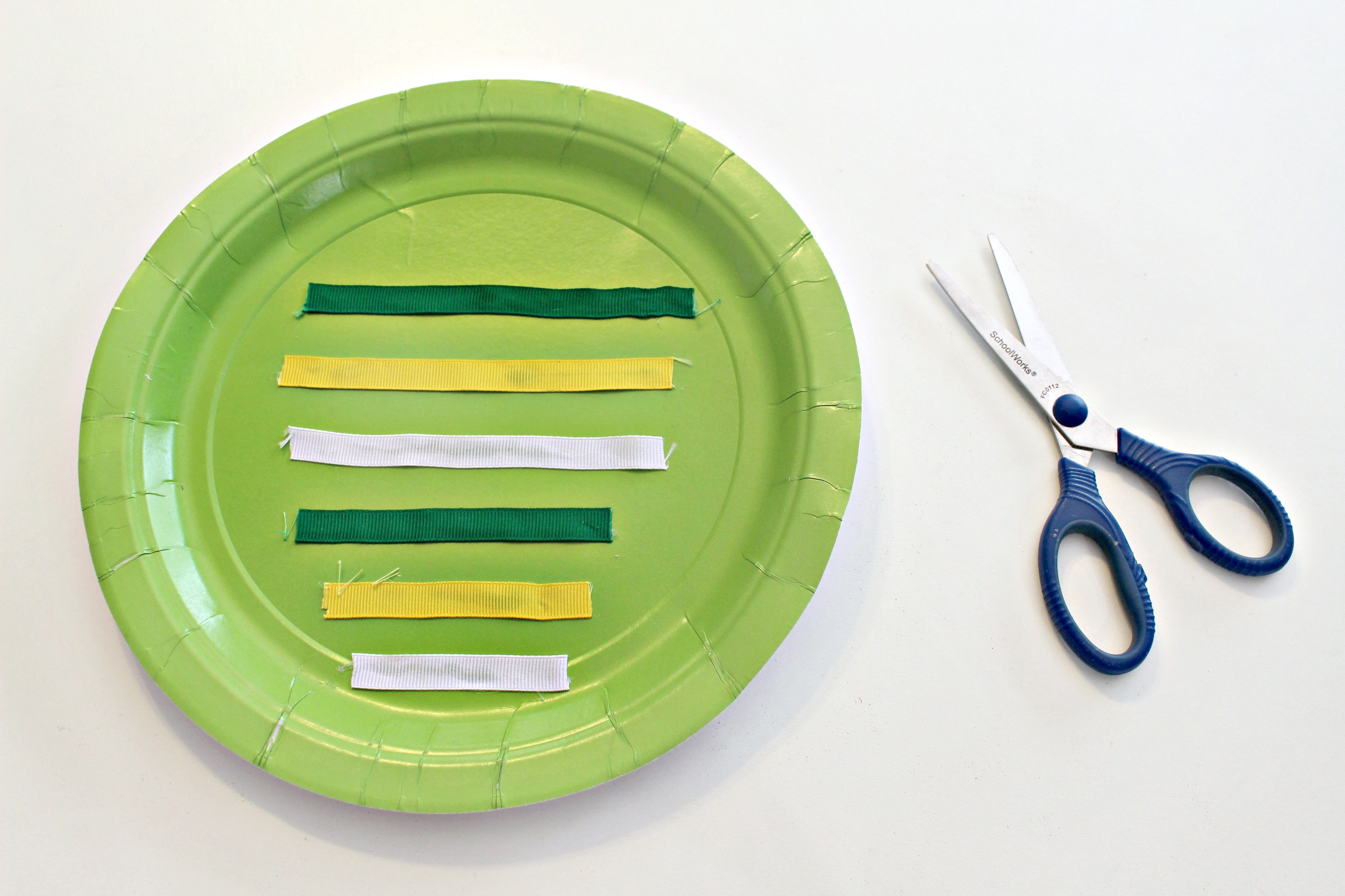 Owl Paper Plate Craft - Placing the ribbon