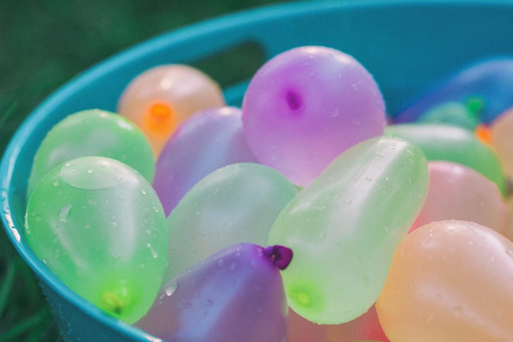 3 Outdoor Games to Play with Kids - Water balloon toss